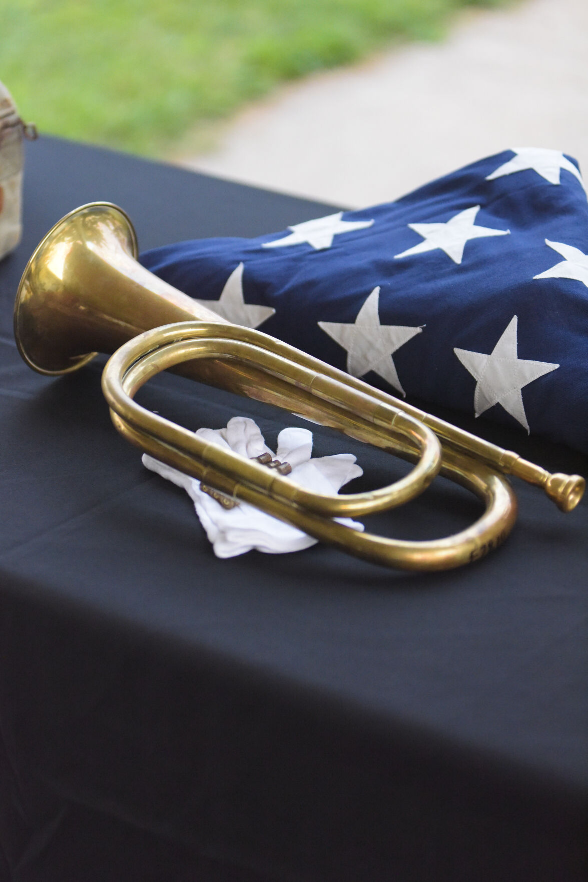 War items are displayed on a table during the American Legion Post 202’s remembrance ceremony for 9/11